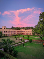 brown building under blue skies
