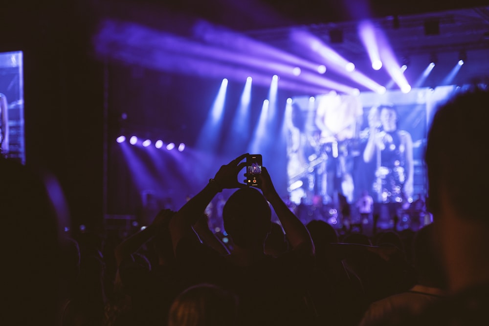 silhouette of person holding camera