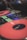 A close-up of a DJ mixing tracks at a vibrant party.