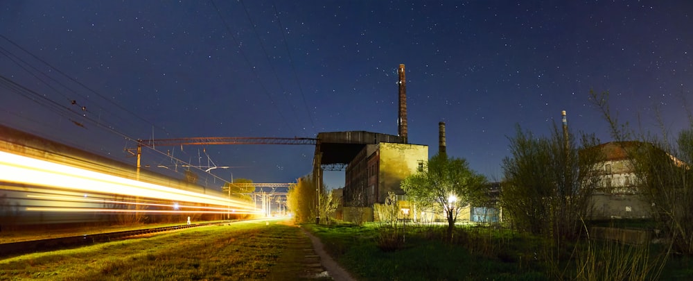 time lapse photography of vehicle lights on road