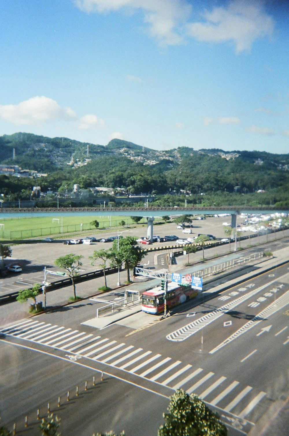 a view of a street with a bus on it