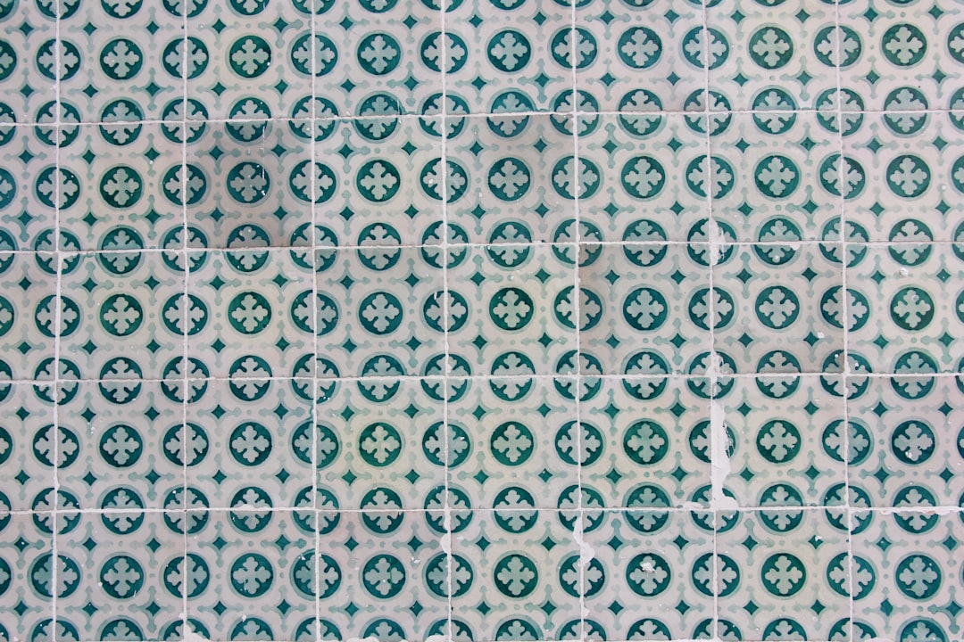 white and green printed textile