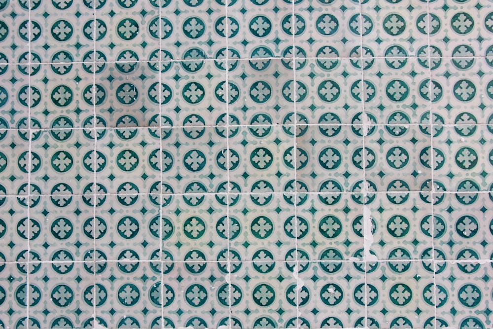 white and green printed textile