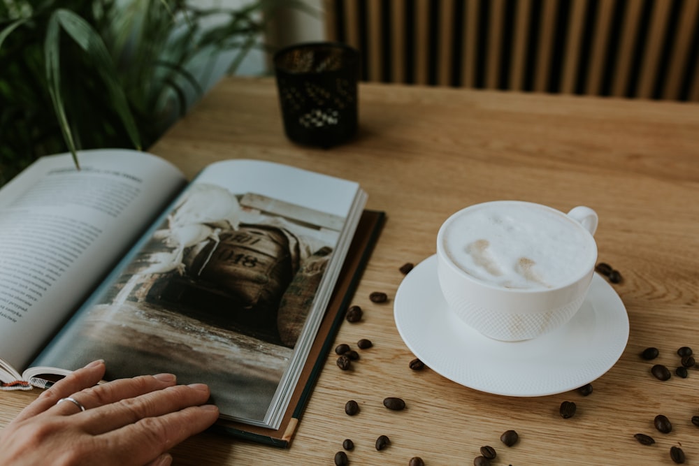 white ceramic cup and saucer