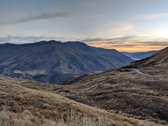 view of valley at daytime in Crown Range Road New Zealand