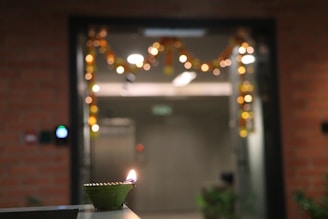 A luxurious festive background with golden sparkles and diyas.