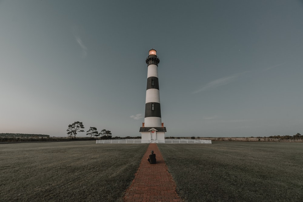 white and black lighthouse miniature