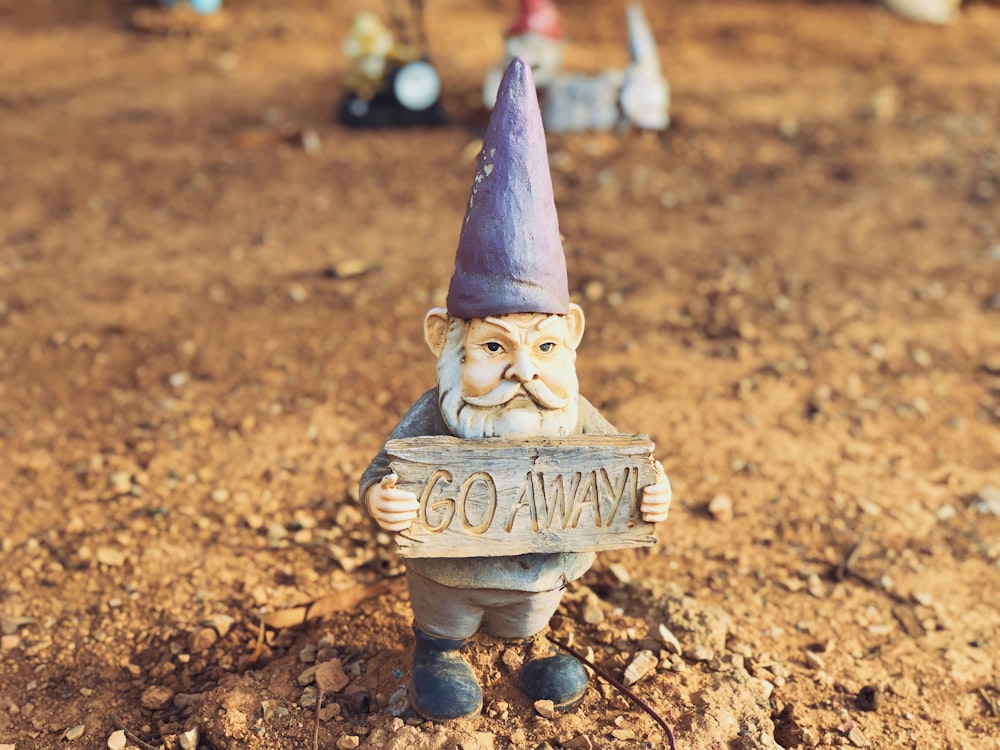 blue and brown ceramic figurine