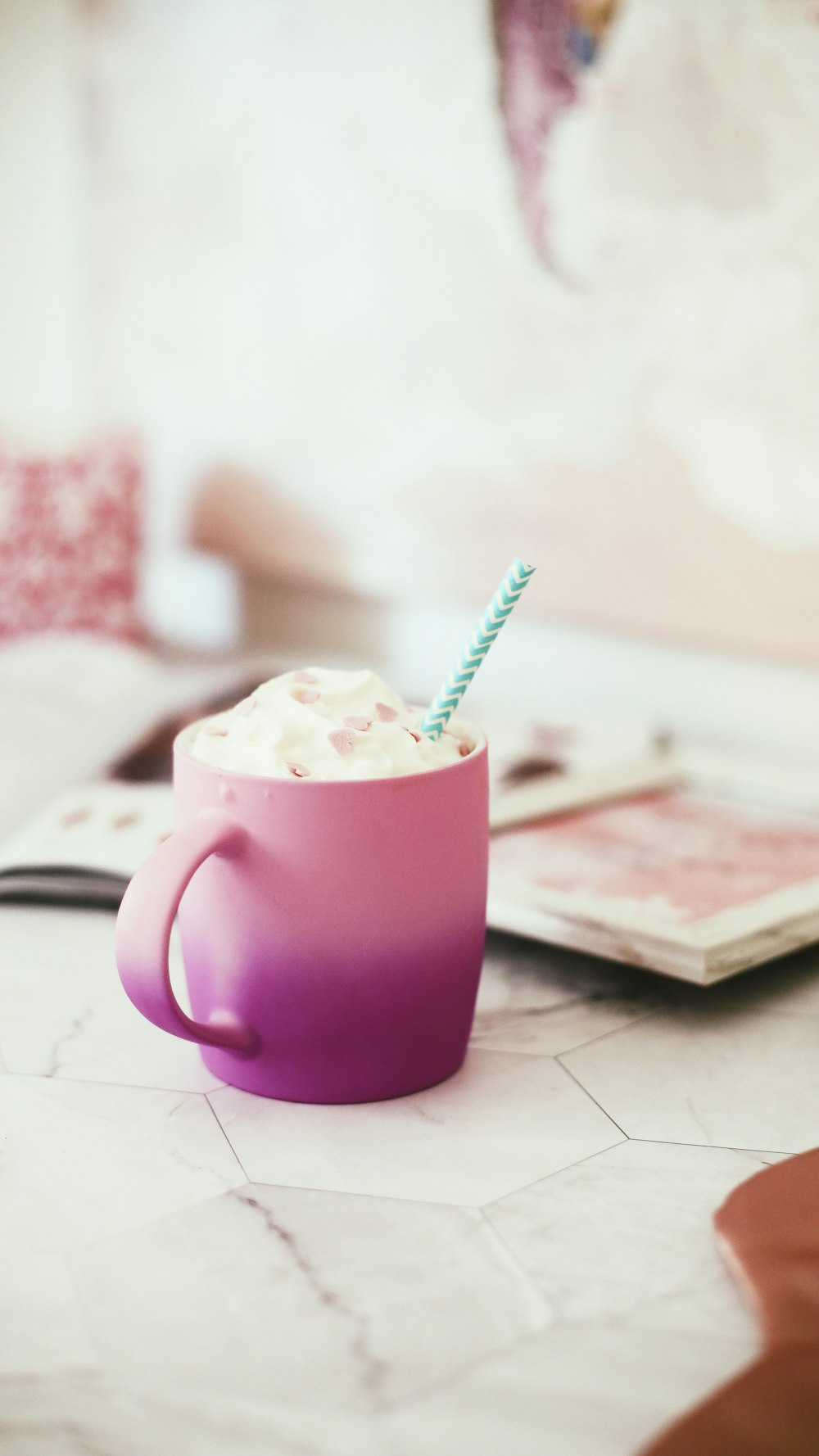 pink mug on white surface
