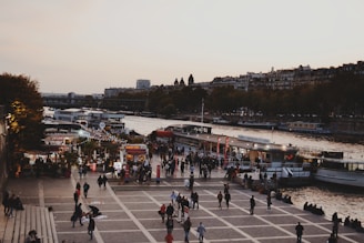 A vibrant community event by the riverside.
