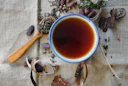 white and brown ceramic mug