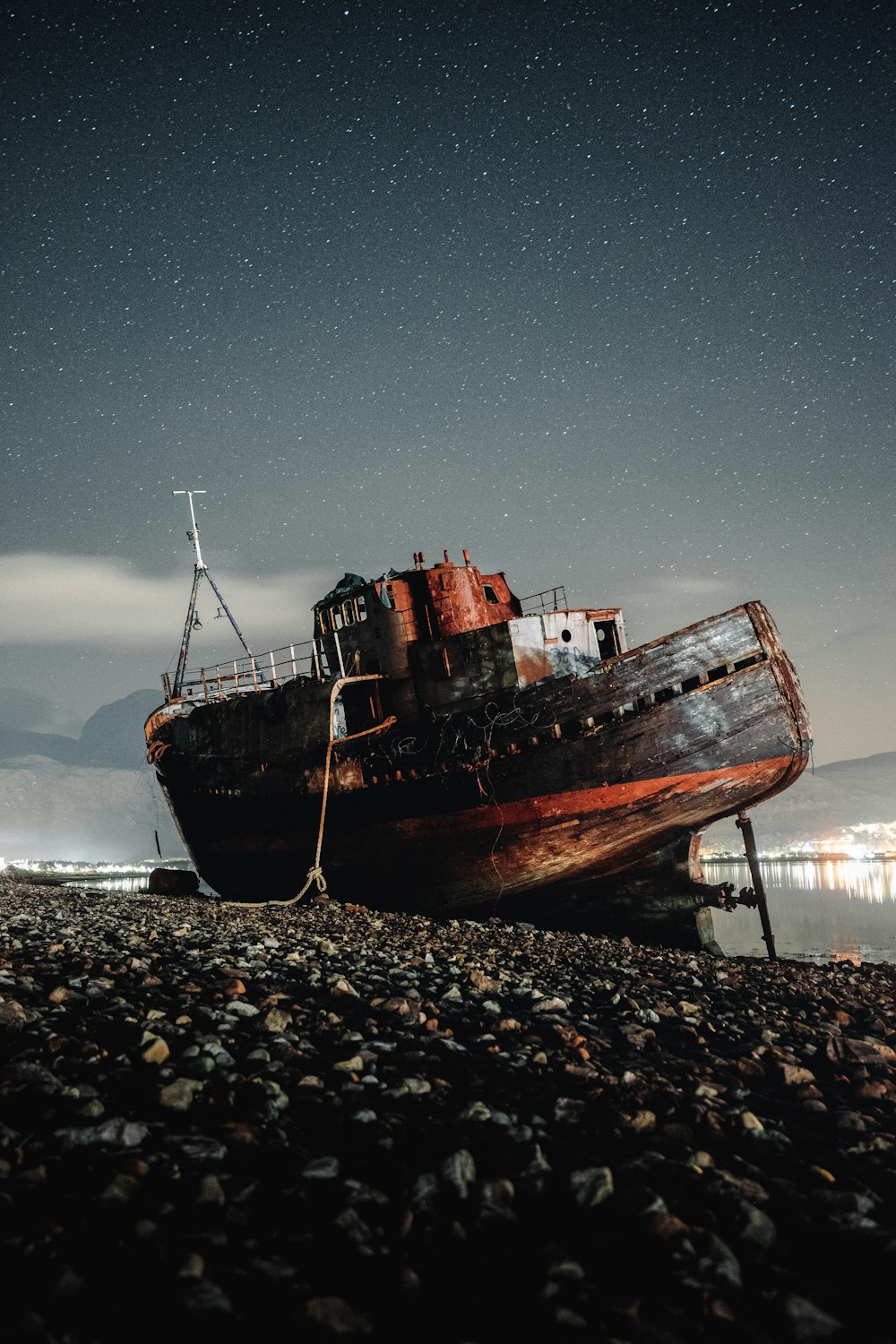 brown ship on seashore