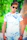 Stylish streetwear look featuring a blue frost custom printed t-shirt worn outdoors.