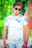 Stylish streetwear look featuring a blue frost custom printed t-shirt worn outdoors.