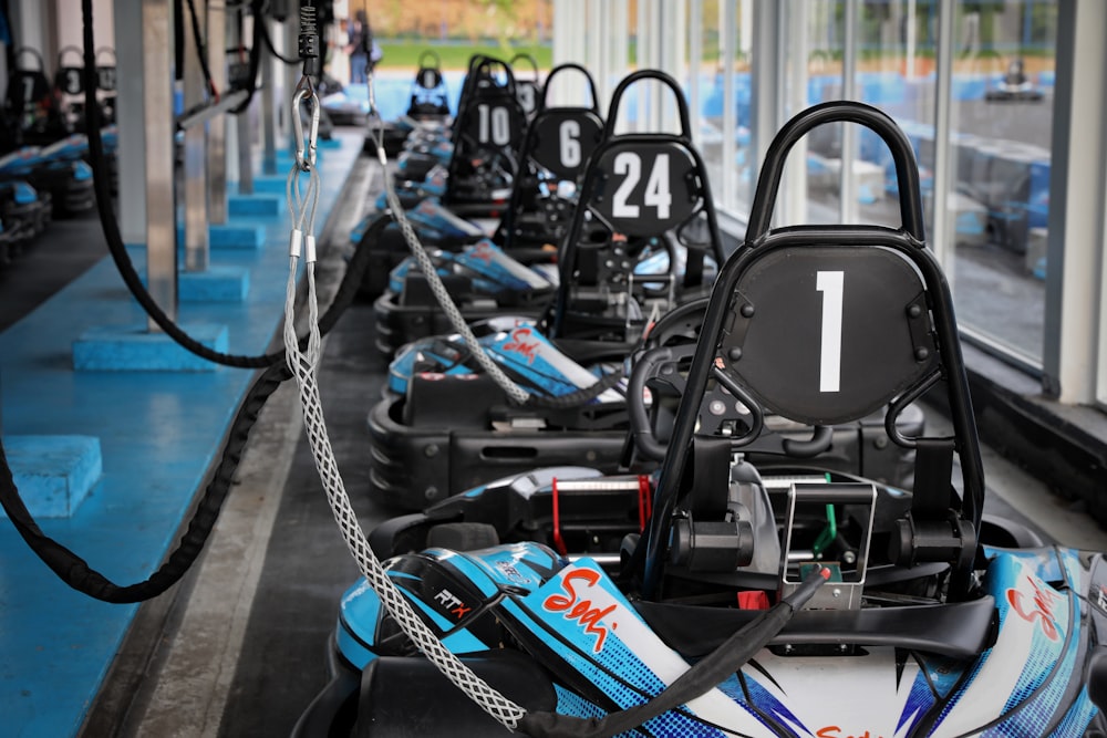 blue and black kart on track side