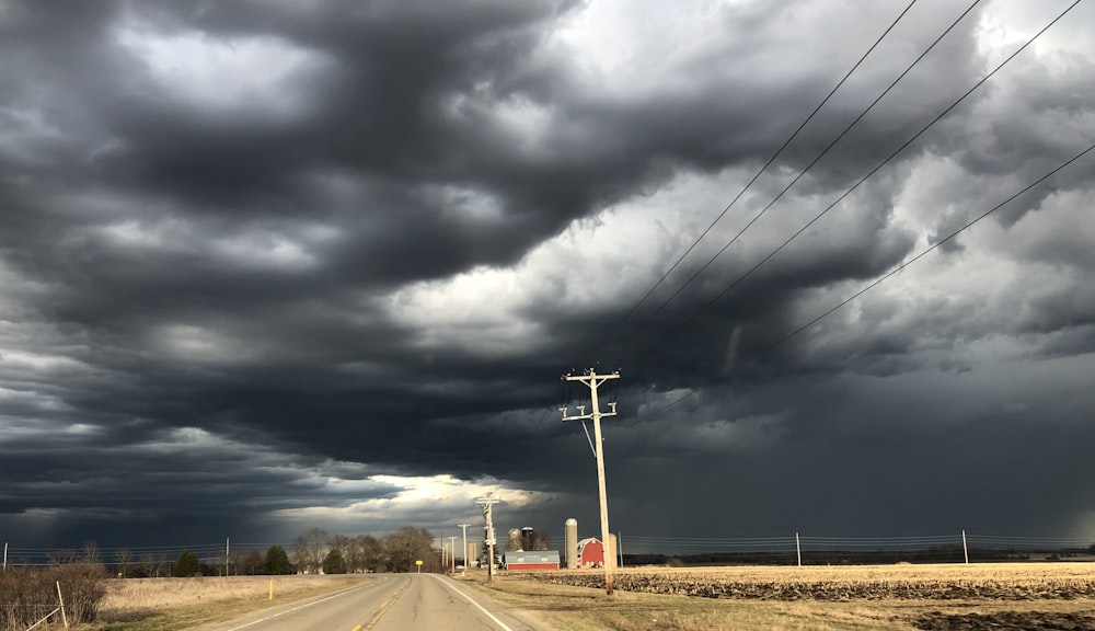 grey road under grey sky