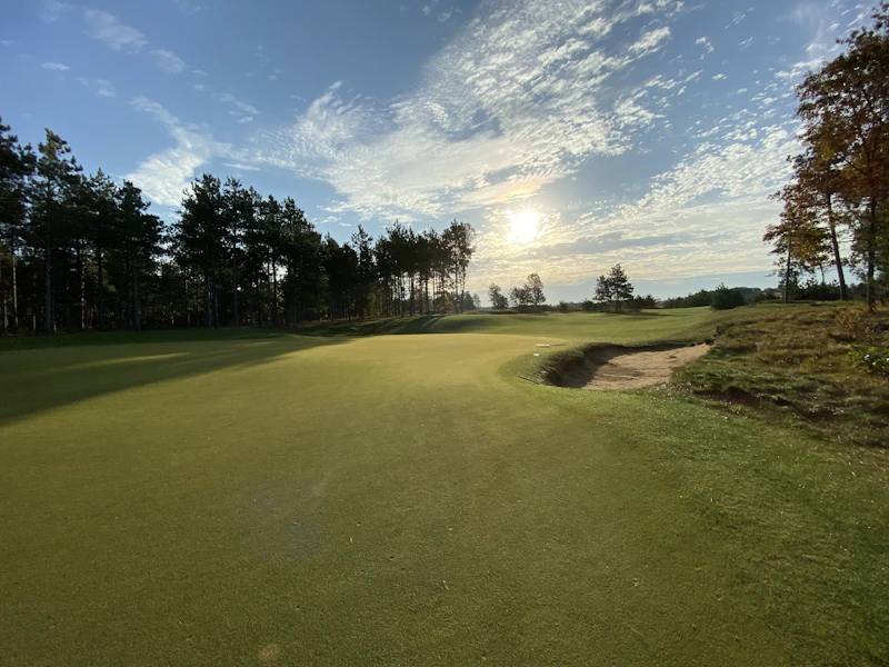 Fairway lit by golden sunset