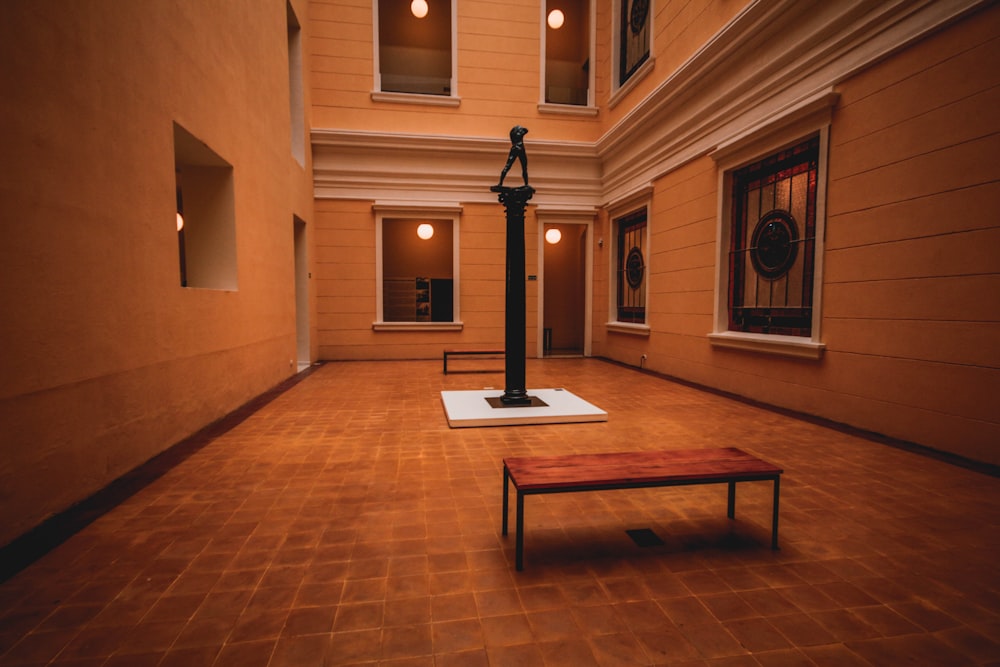 rectangular brown wooden table inside building