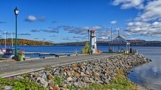 white and red lighthouse in Piopolis Canada