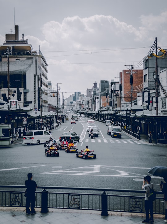 white and yellow car screenshot in Yasaka Shrine Japan