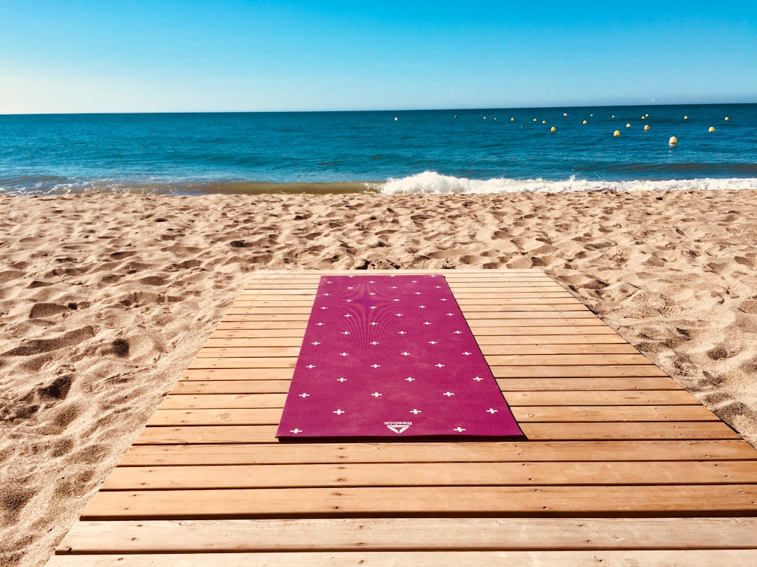 red and white wooden board, Yoga time on a beach