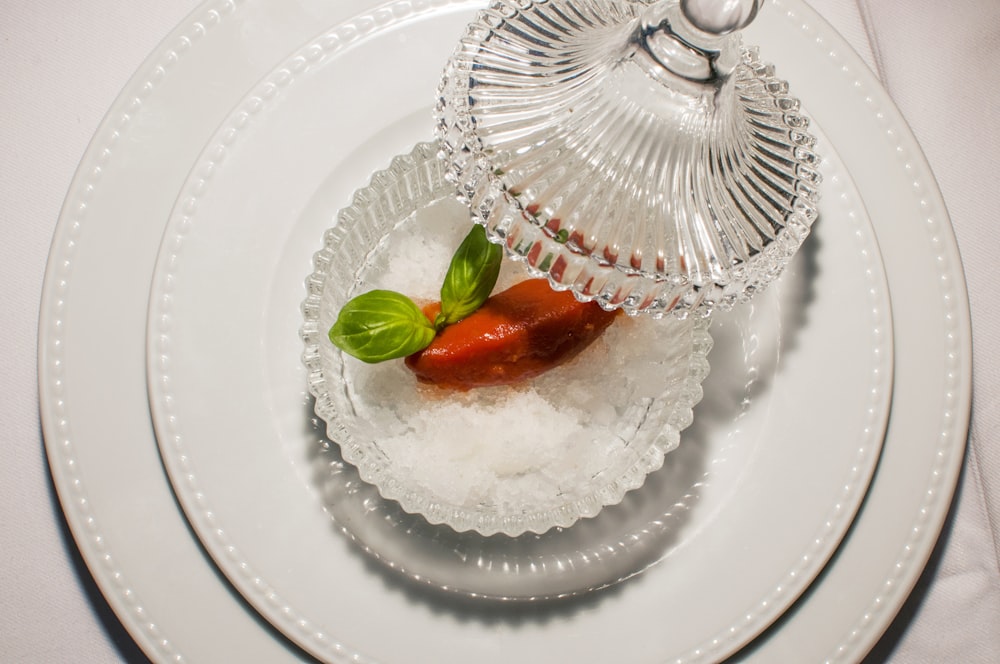 white and red ceramic plate