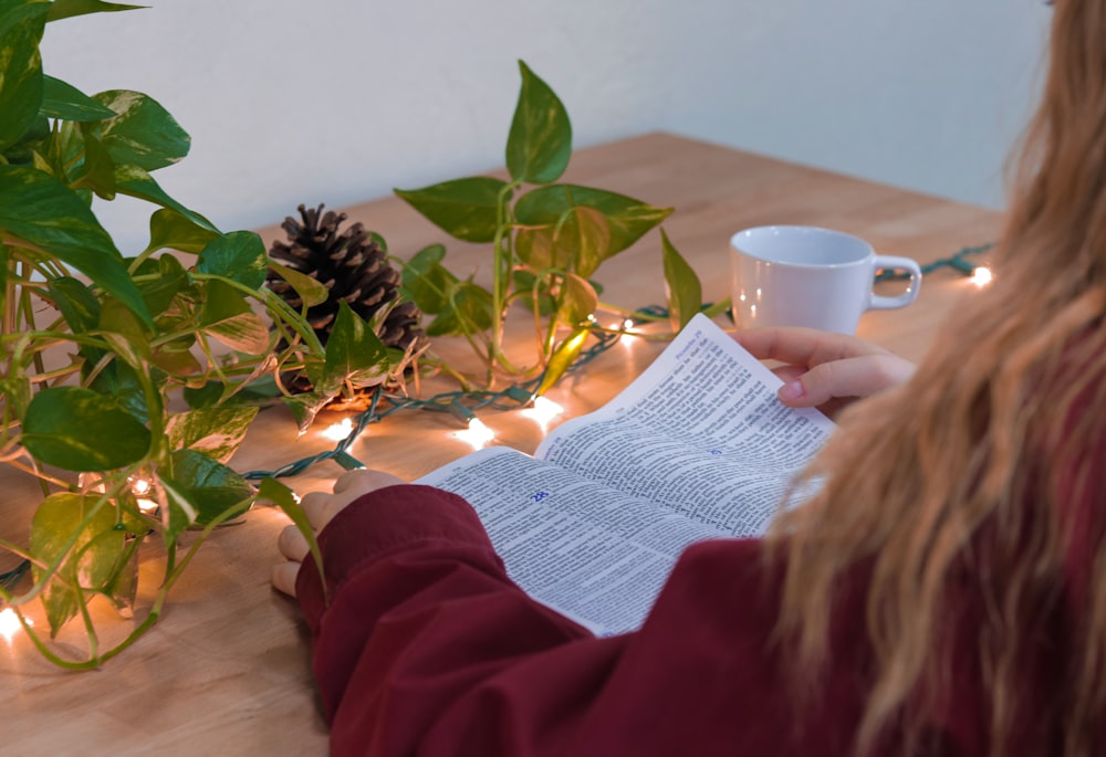 woman holding book