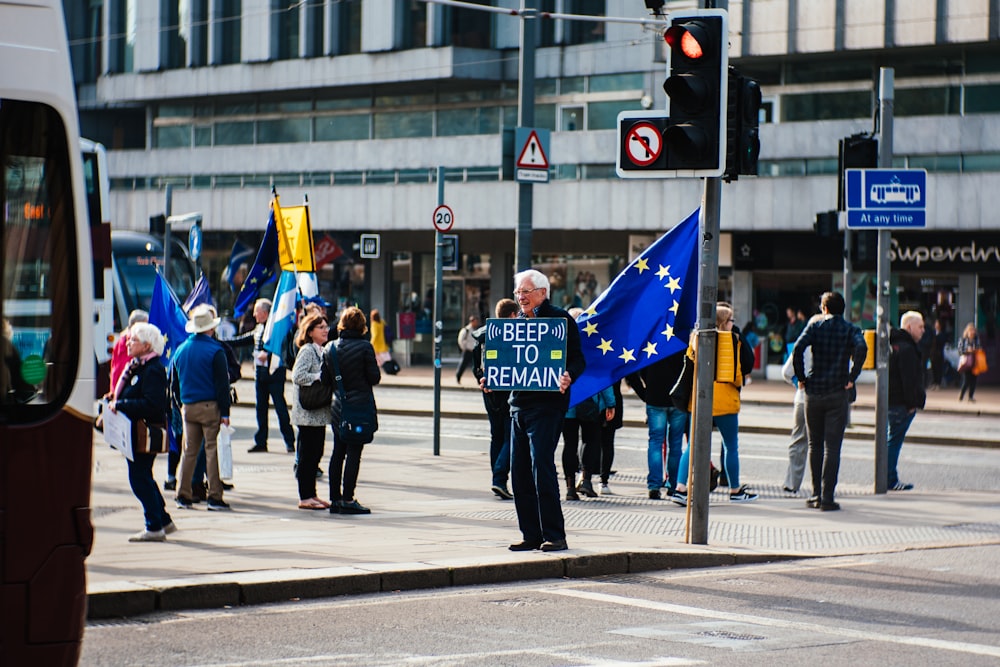 man holding placard