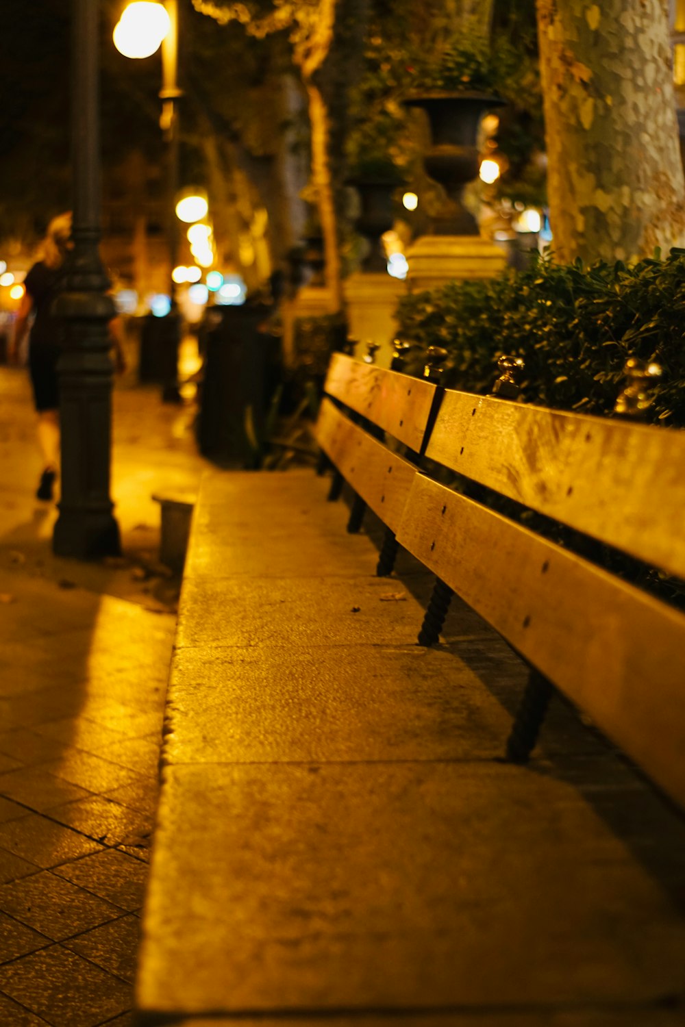 empty bench near lamp post