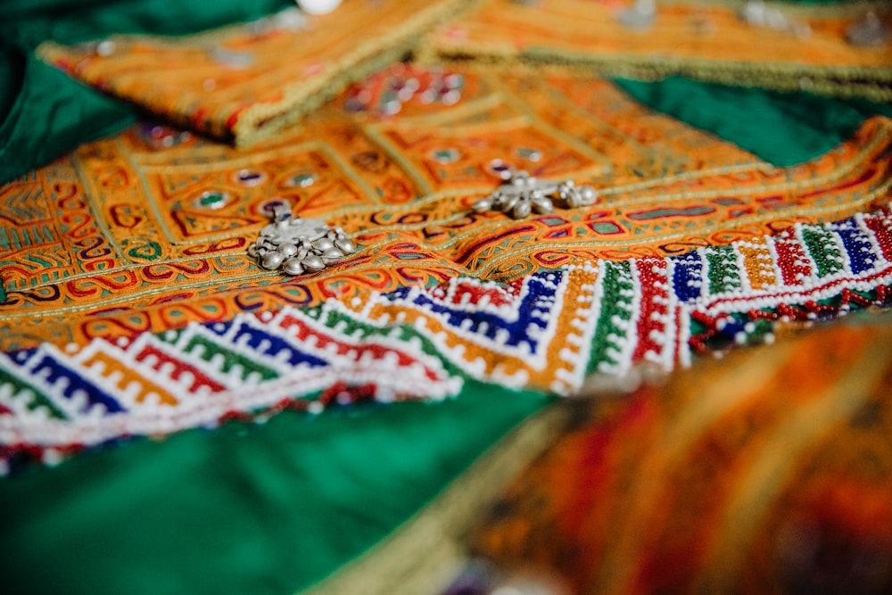 orange and green textile