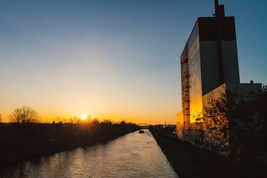 curtain wall building beside body of water in Baumschulenweg Germany