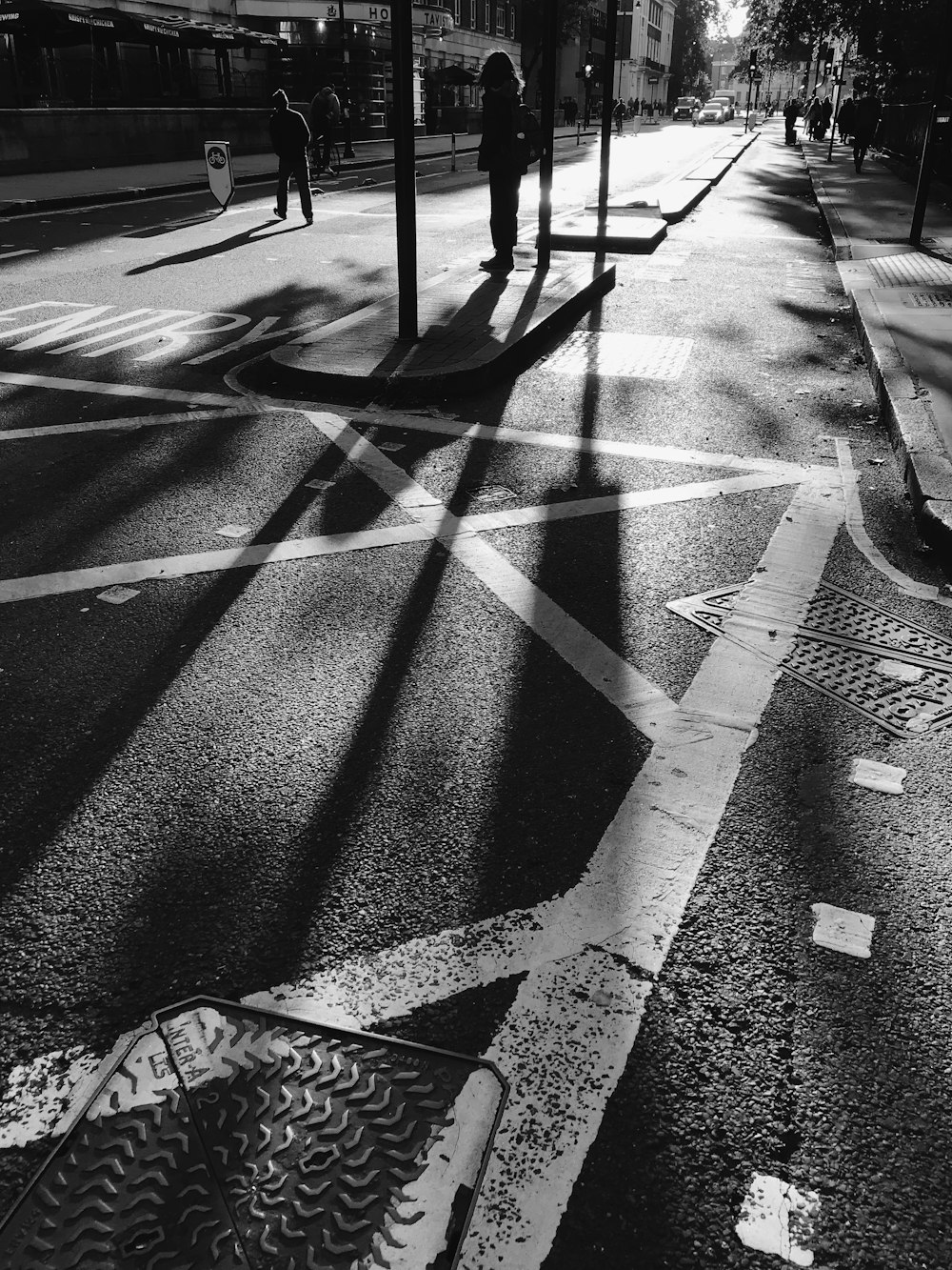 grayscale photography of road during daytime