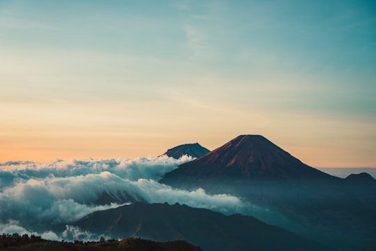 mountain under blue sky in Gunung Sindoro Indonesia