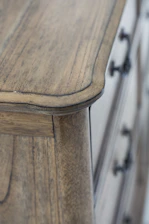 edge of brown wooden drawer