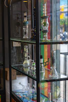 A vibrant display of various smoking accessories arranged neatly on a market stall.