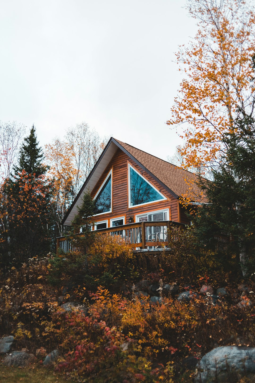 brown concrete house surrounded with trees during daytime