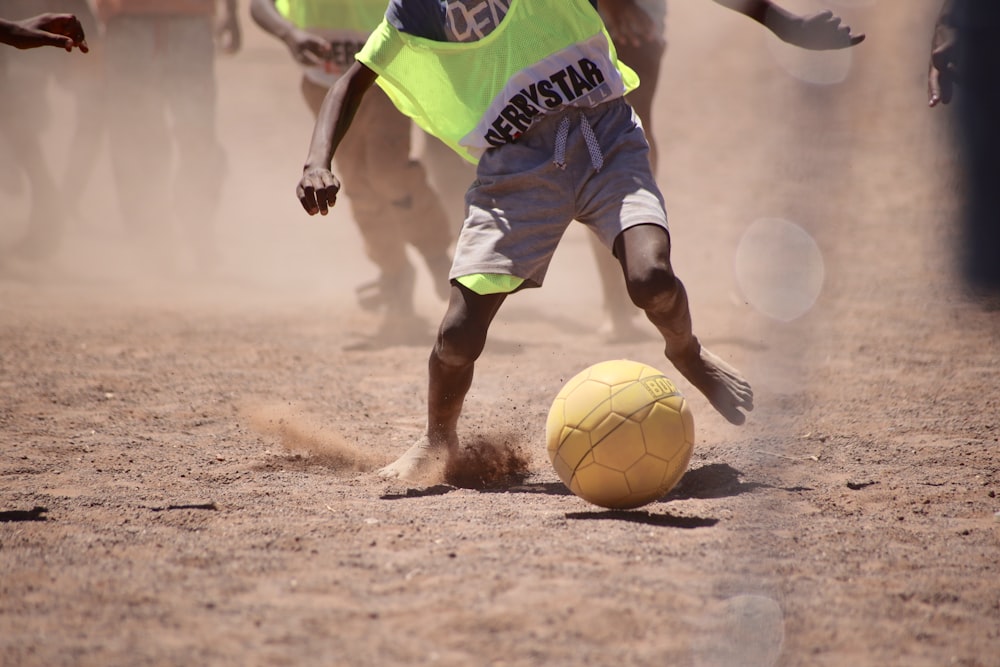 child playing soccer