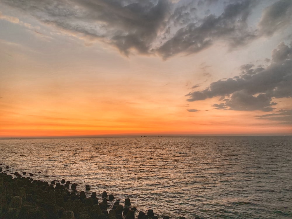 calm sea water during golden hour