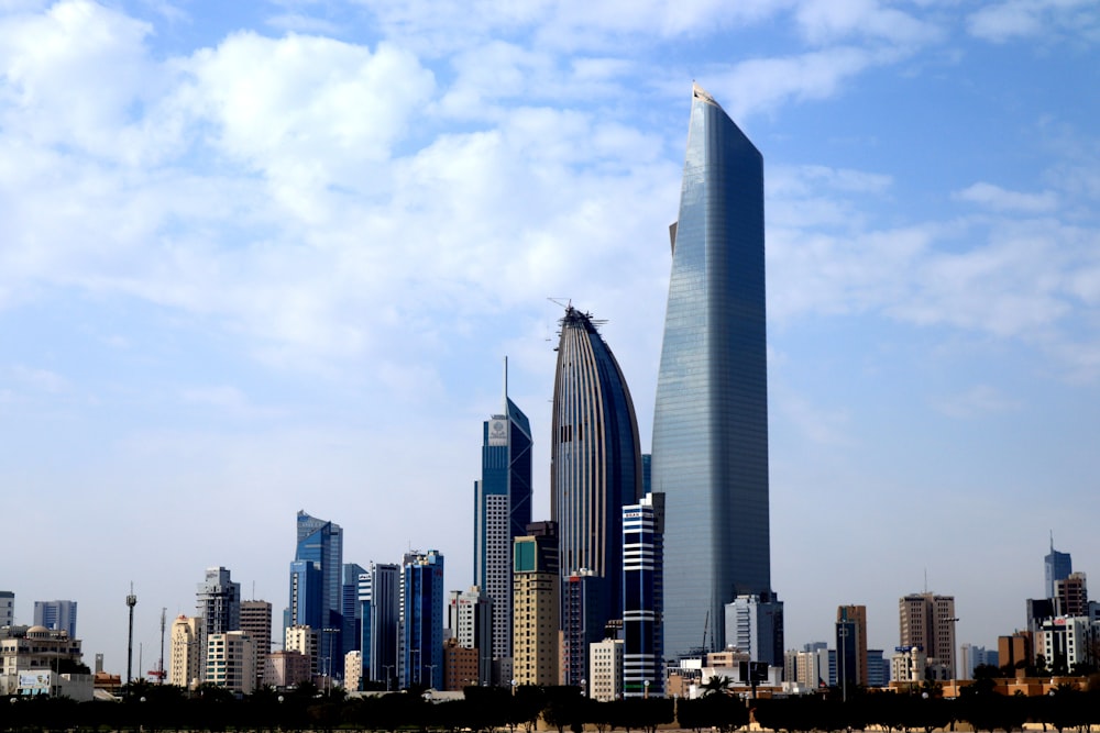 photography of buildings under blue sky