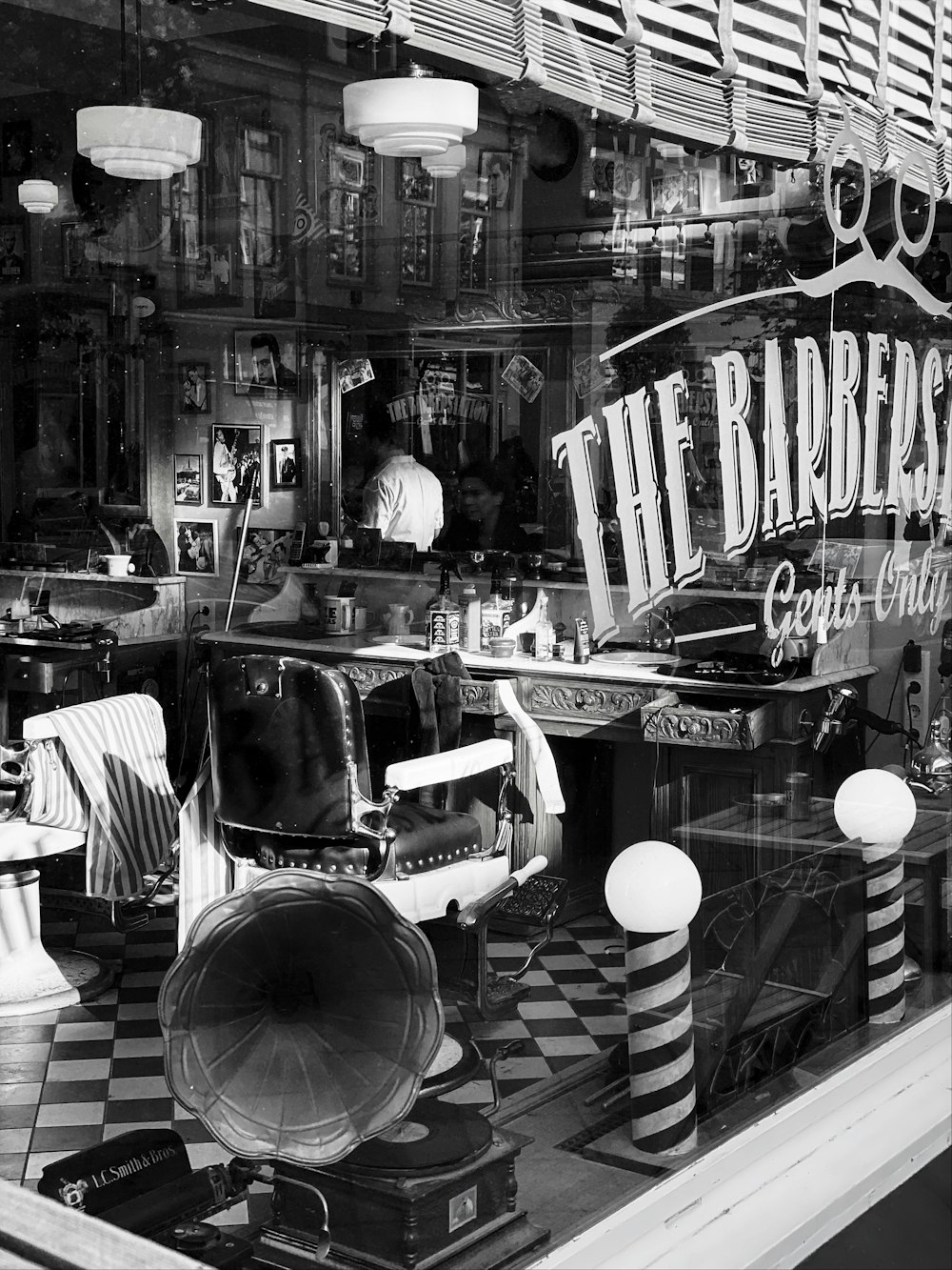 The Barbers store in grayscale photography
