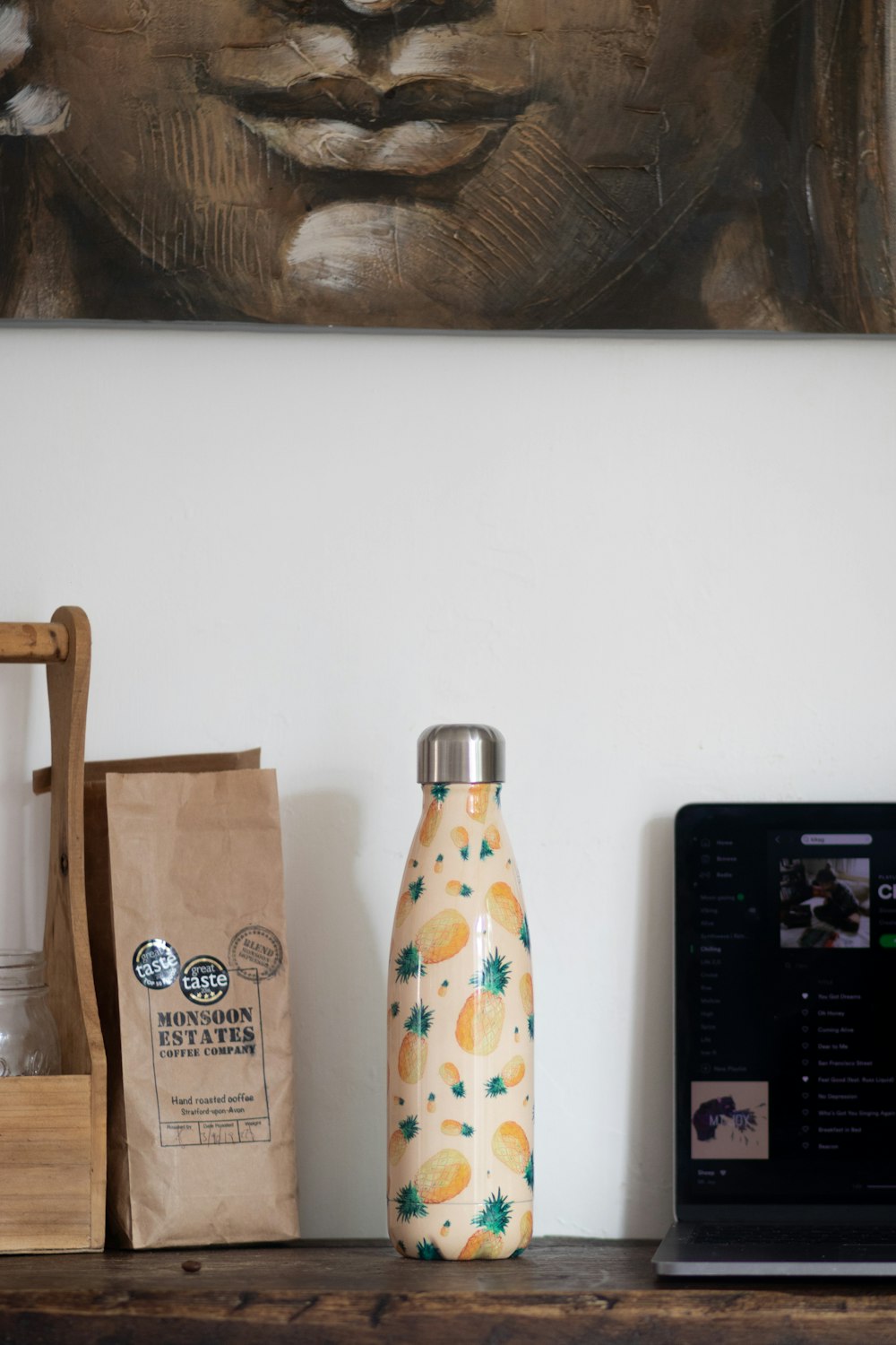 beige and blue sports bottle beside brown paper pack