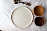 white tray and two brown bowls