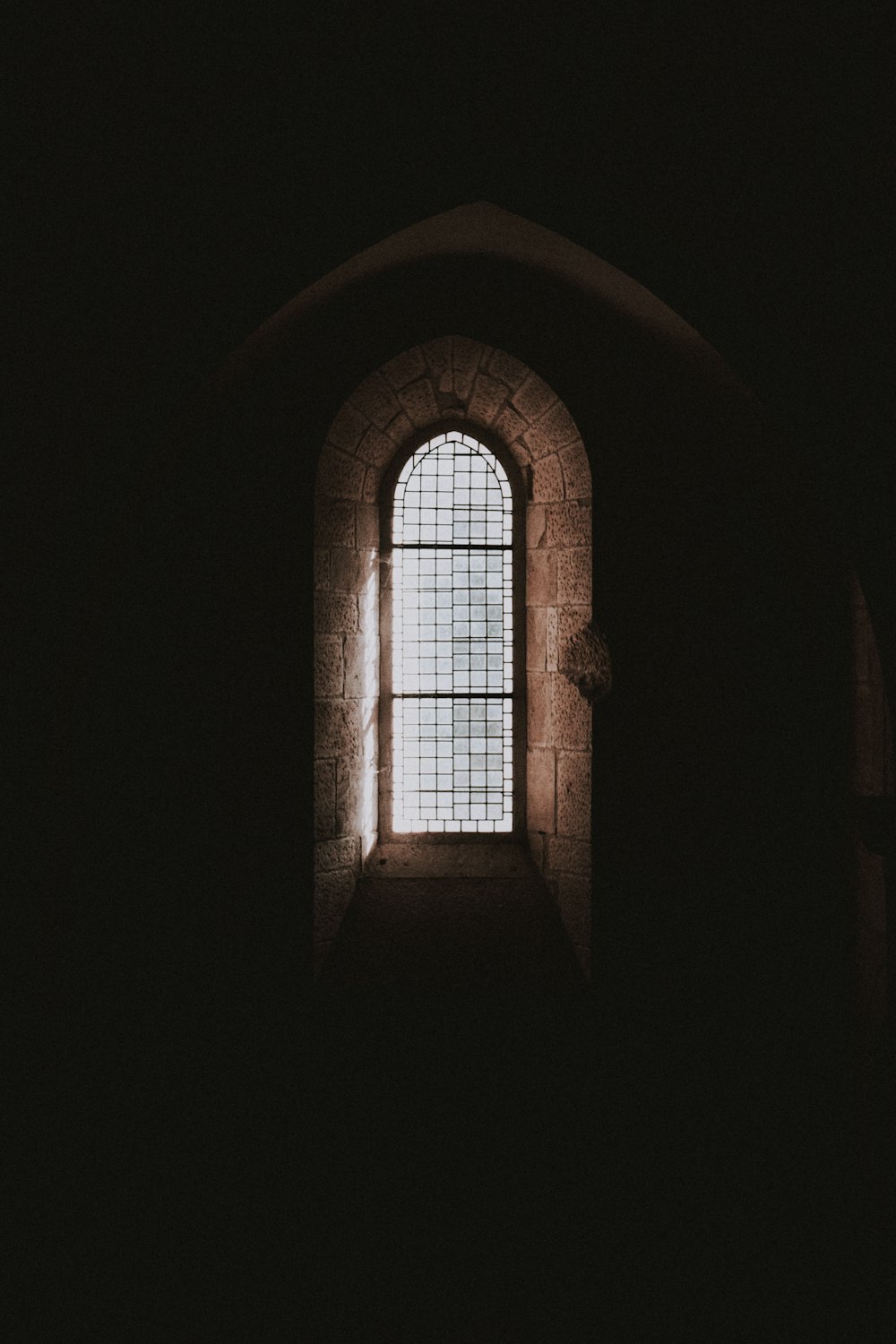 closed gray wooden framed window