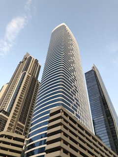 low-angle photography of mirror building