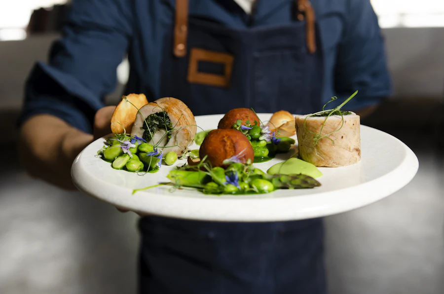 Roasted meat course on a dark plate