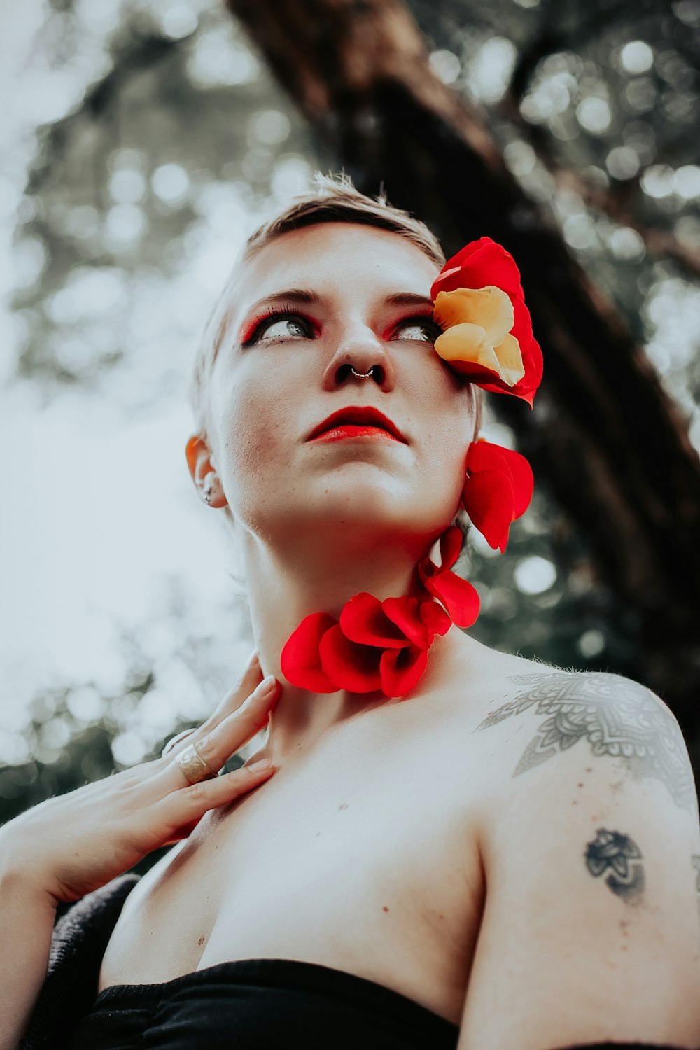 woman wearing red flower decor