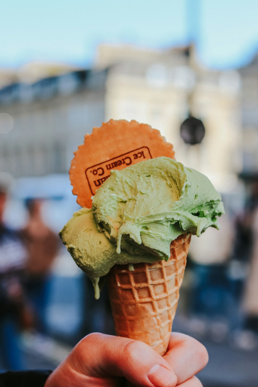 green ice cream in cone in macro photography