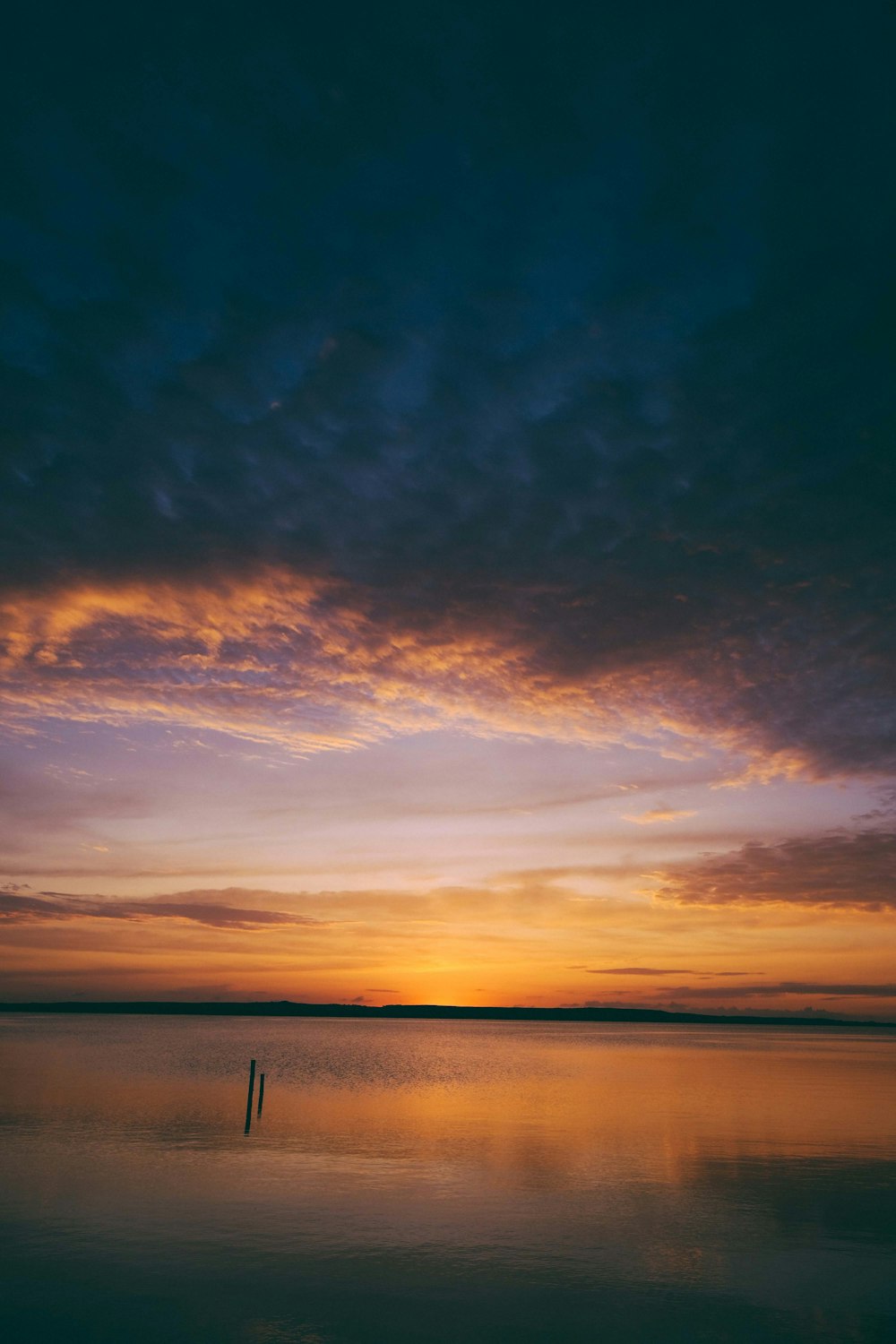 body of water during golden hour