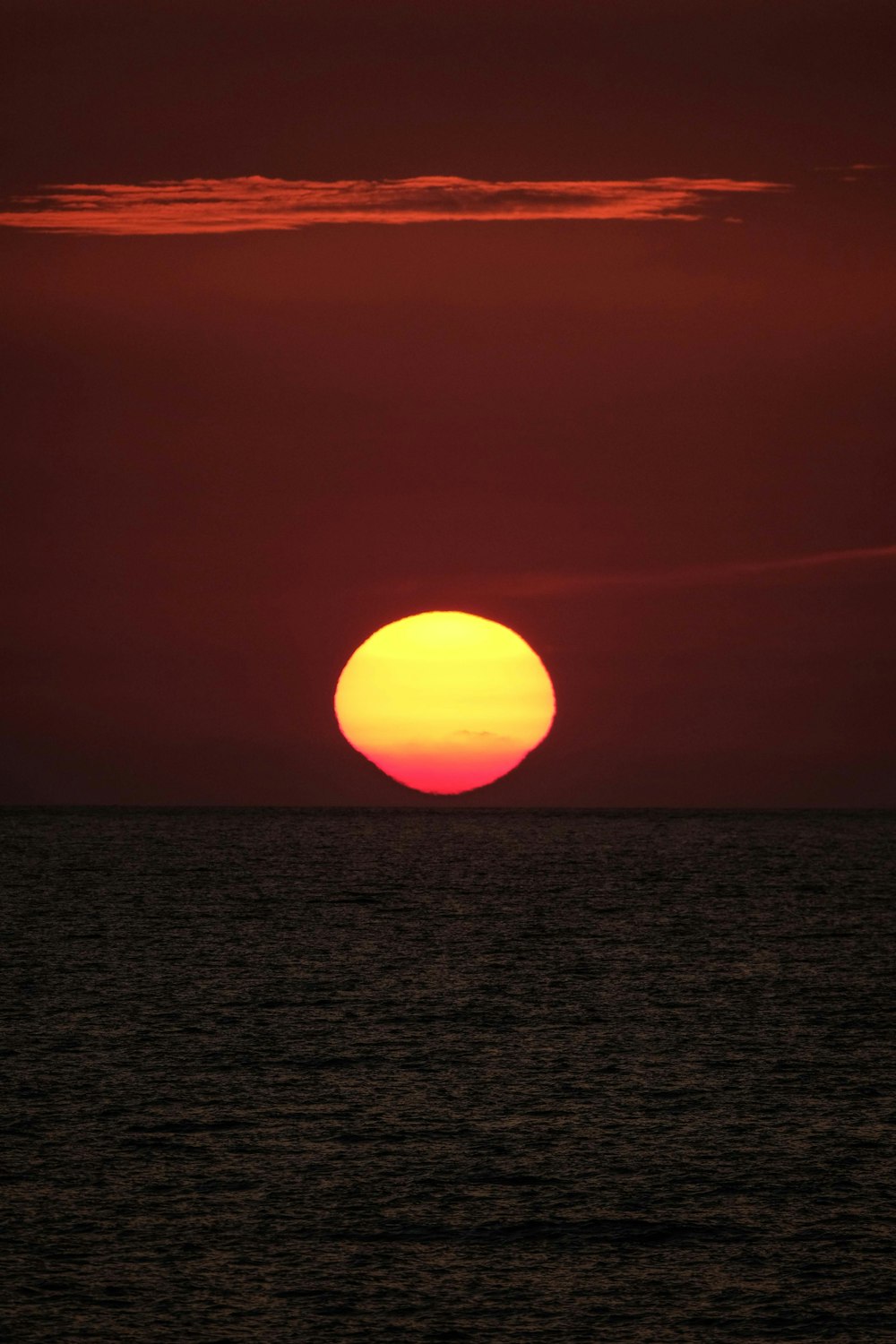 body of water showing full moon