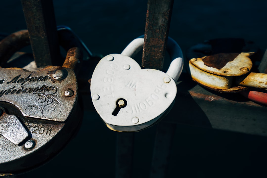 white metal hear-shape padlock